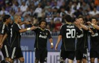 48986-real-madrids-higuain-is-congratulated-by-his-team-mates-afte