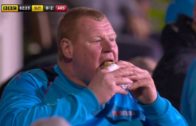 Wayne-Shaw-the-Sutton-reserve-goalkeepereats-a-pie-in-the-dugout-at-halftime